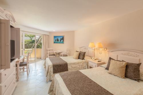 Habitación Doble Estándar con vistas al jardín del hotel Posada Real. Foto 1