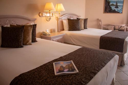 Habitación Doble Estándar con vistas al jardín del hotel Posada Real. Foto 9