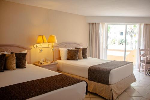 Habitación Doble con vistas frontales al mar del hotel Posada Real. Foto 6