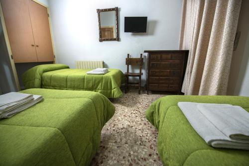 Habitación Triple del hotel Santa Bárbara. Foto 4