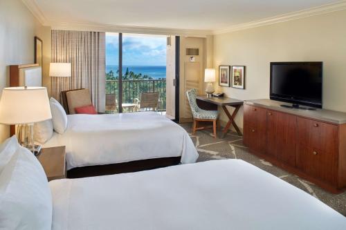 Habitación Doble con vistas al océano - 2 camas dobles del hotel Hilton Hawaiian Village Waikiki Beach Resort. Foto 2