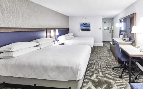 Habitación Deluxe con 2 camas grandes del hotel Riu Plaza Fisherman´s Wharf. Foto 1