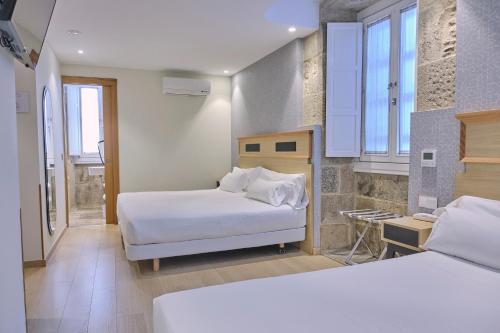 Habitación Cuádruple del hotel Praza Quintana. Foto 1
