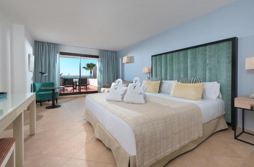 Habitación Familiar Doble Exclusiva con vistas al mar del hotel Fuerte El Rompido. Foto 6