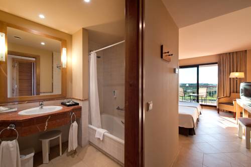 Habitación Doble Clásica dos camas individuales del hotel Fuerte El Rompido. Foto 1