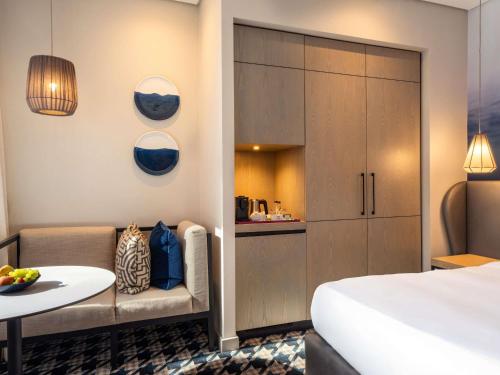 Habitación Clásica con cama extragrande del hotel Pullman Cape Town City Centre. Foto 1