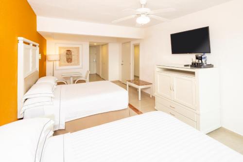 Habitación Doble del hotel Occidental Costa Cancún All Inclusive. Foto 3