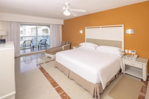 Habitación Doble con Terraza del hotel Occidental Costa Cancún All Inclusive. Foto 1