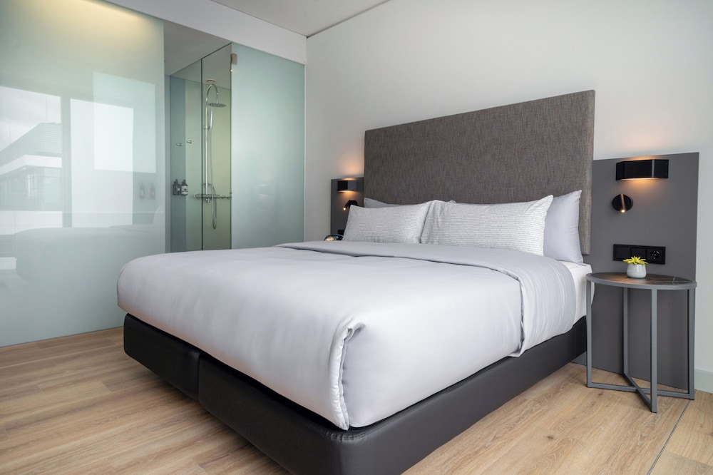 Habitación doble Vista Patio 2 Camas individuales 1 Cama doble del hotel Innside München Parkstadt Schwabing