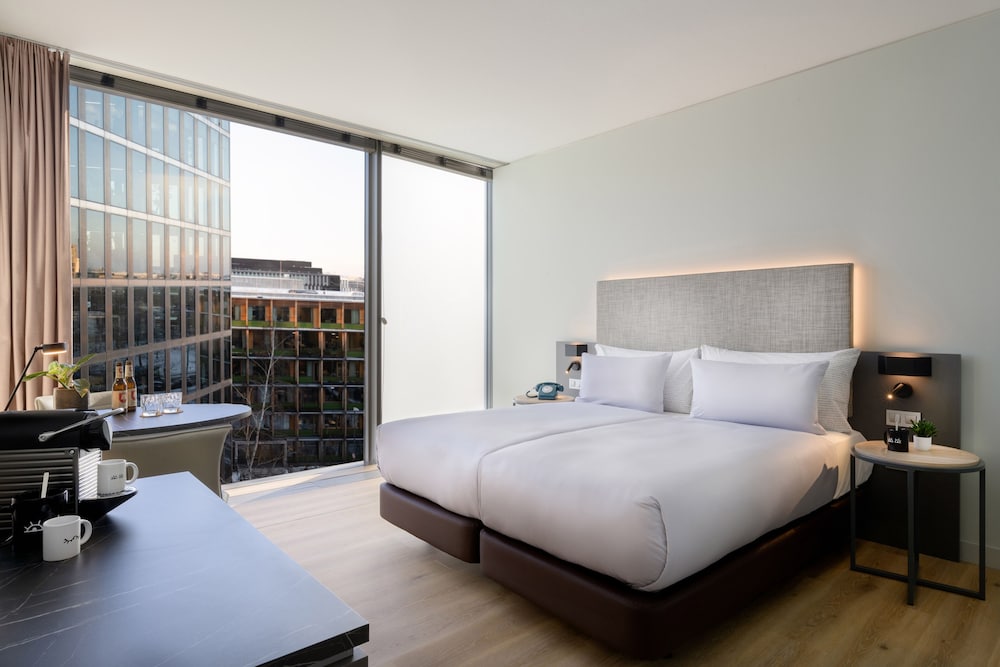 Habitación doble 1 Cama king Vista Patio Premium Con Vistas 2 Camas individuales del hotel Innside München Parkstadt Schwabing. Foto 1