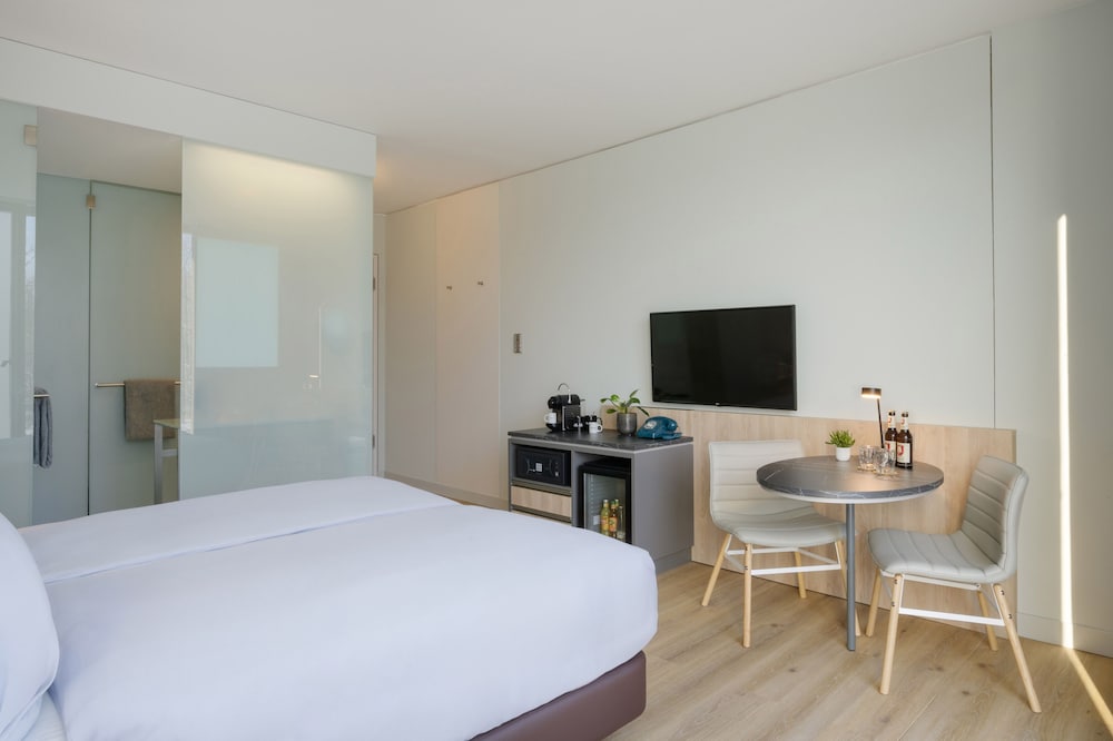 Habitación doble 1 Cama king Vista Patio Premium Con Vistas 2 Camas individuales del hotel Innside München Parkstadt Schwabing. Foto 2