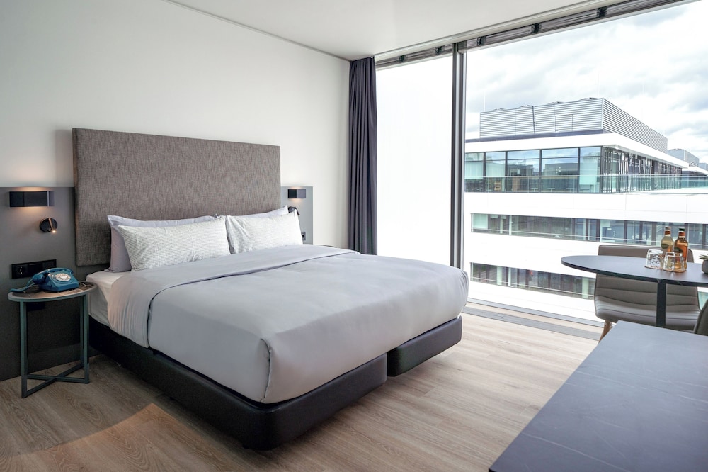 Habitación doble 1 Cama king Vista Patio Premium Con Vistas 2 Camas individuales del hotel Innside München Parkstadt Schwabing. Foto 15