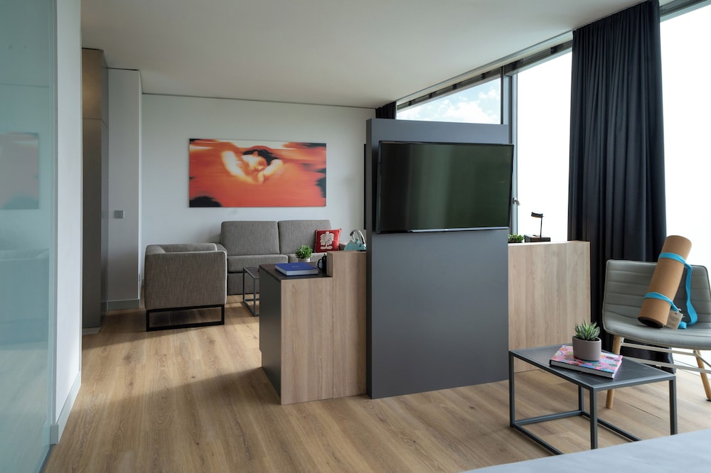 Loft 1 Cama king 1 habitación Vista Patio del hotel Innside München Parkstadt Schwabing. Foto 5