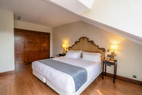 Habitación Familiar del hotel Palacio Aviles, Affiliated By Meliá. Foto 3