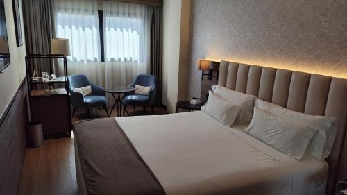 Habitación Doble Estándar - 1 o 2 camas del hotel NH Ciudad Real. Foto 1