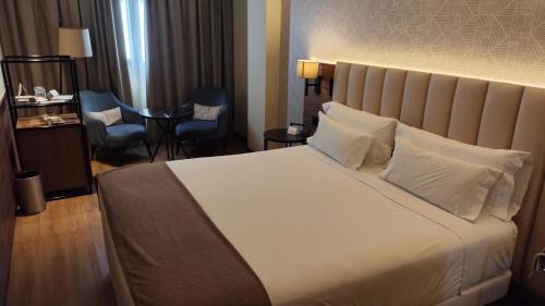 Habitación doble 2 Camas individuales del hotel NH Ciudad Real. Foto 3