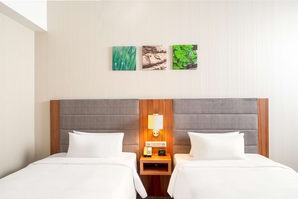 Habitación con 2 camas individuales, 2 camas individuales del hotel Hilton Garden Inn Bucharest Old Town. Foto 1