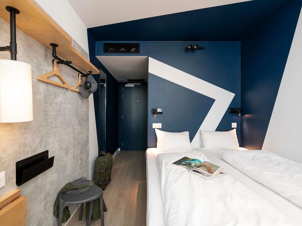 Habitación con 2 camas individuales del hotel Ibis Budget Gent Centrum Dampoort. Foto 3