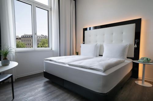 Habitación INNSiDE - Vistas a la Iglesia de San Tomás del hotel Innside By Meliá Leipzig