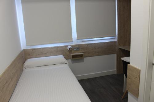 Habitación Individual Deluxe con balcón del hotel Deluxe Hostels And Suites Merida