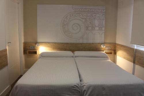 Habitación Doble Deluxe - 1 o 2 camas del hotel Deluxe Hostels And Suites Merida. Foto 3