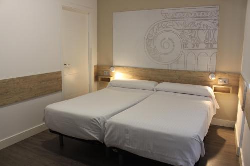 Habitación Doble Deluxe - 1 o 2 camas del hotel Deluxe Hostels And Suites Merida. Foto 4