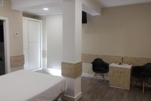 Suite Deluxe del hotel Deluxe Hostels And Suites Merida. Foto 4