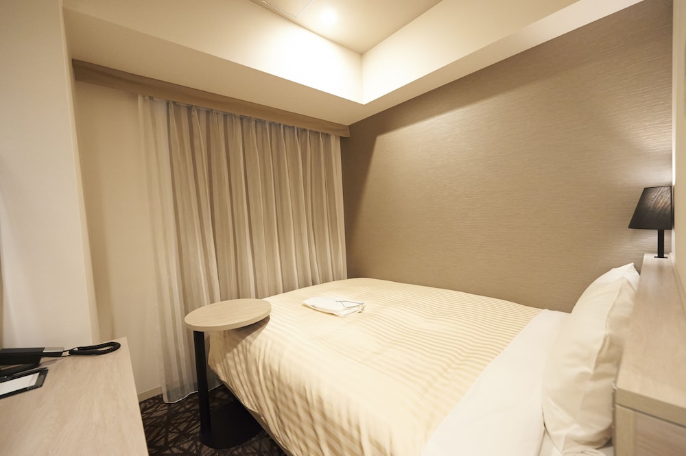Habitación individual, no fumadores del hotel Sotetsu Fresa Inn Ginza Nanachome. Foto 4
