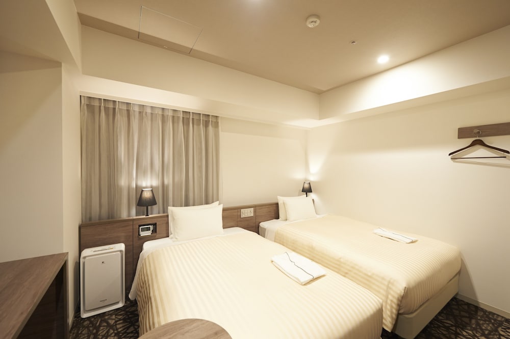 Habitación Deluxe con 2 camas individuales, fumadores del hotel Sotetsu Fresa Inn Ginza Nanachome. Foto 1