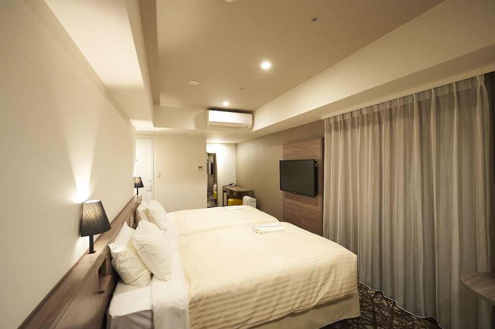 Habitación Premium con 2 camas individuales, fumadores del hotel Sotetsu Fresa Inn Ginza Nanachome. Foto 2