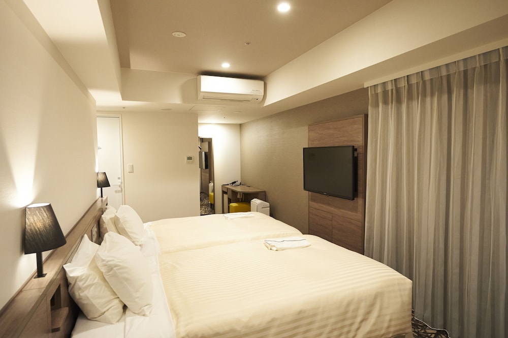 Habitación Premium con 2 camas individuales, fumadores del hotel Sotetsu Fresa Inn Ginza Nanachome. Foto 3