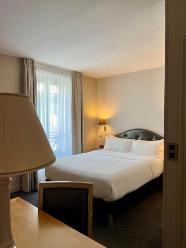 Habitación Doble Confort del hotel Central Saint Germain. Foto 7