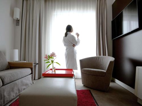 Suite, 1 double bed with double sofa bed del hotel Novotel Athenes. Foto 1