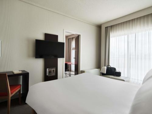 Suite, 1 double bed with double sofa bed del hotel Novotel Athenes. Foto 5
