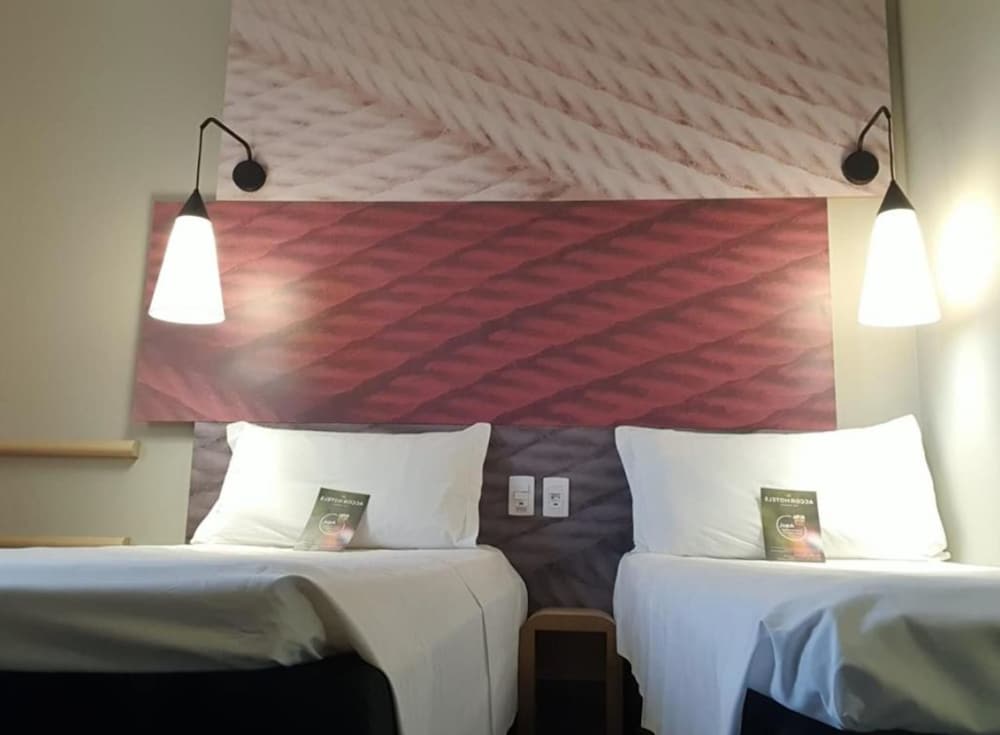 Habitación Standard con 2 camas individuales del hotel Ibis Ribeirao Preto Shopping. Foto 1