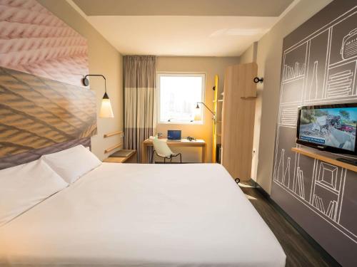 APARTAMENTO SUPERIOR CON ROPA DE CAMA PERSONALIZADA, MINIBAR SURTIDO Y SMART TV del hotel Ibis Ribeirao Preto Shopping. Foto 1