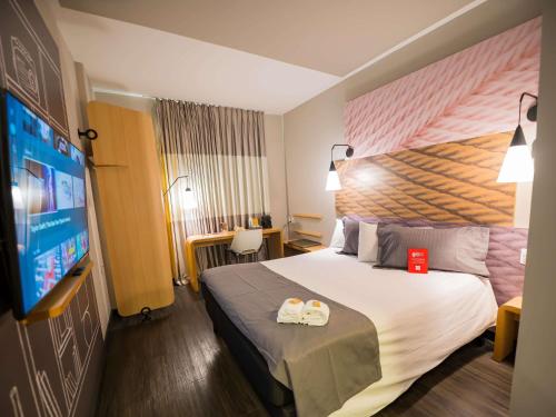 APARTAMENTO SUPERIOR CON ROPA DE CAMA PERSONALIZADA, MINIBAR SURTIDO Y SMART TV del hotel Ibis Ribeirao Preto Shopping. Foto 2