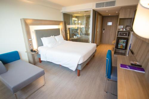 APARTAMENTO EJECUTIVO CON 1 CAMA QUEEN Y VISTA AL MAR del hotel Novotel Rj Porto Atlântico. Foto 5