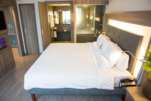 APARTAMENTO EJECUTIVO CON 1 CAMA QUEEN Y VISTA AL MAR del hotel Novotel Rj Porto Atlântico. Foto 8