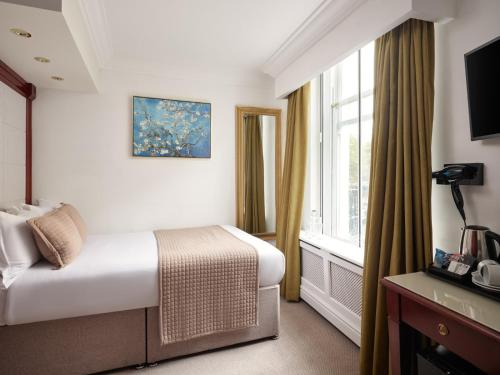 Habitación Doble Pequeña del hotel The Prime London. Foto 7