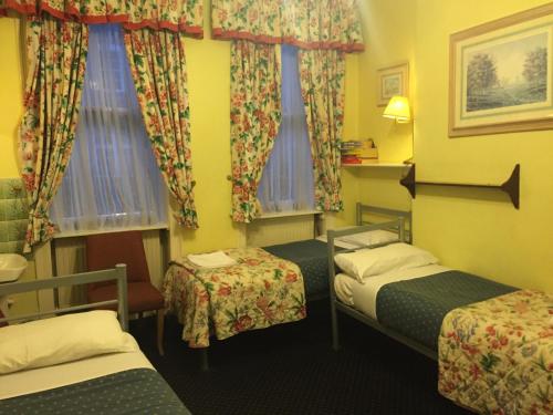 Habitación Triple del hotel Albany. Foto 19