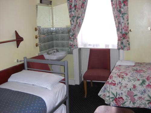 Habitación Triple del hotel Albany. Foto 20