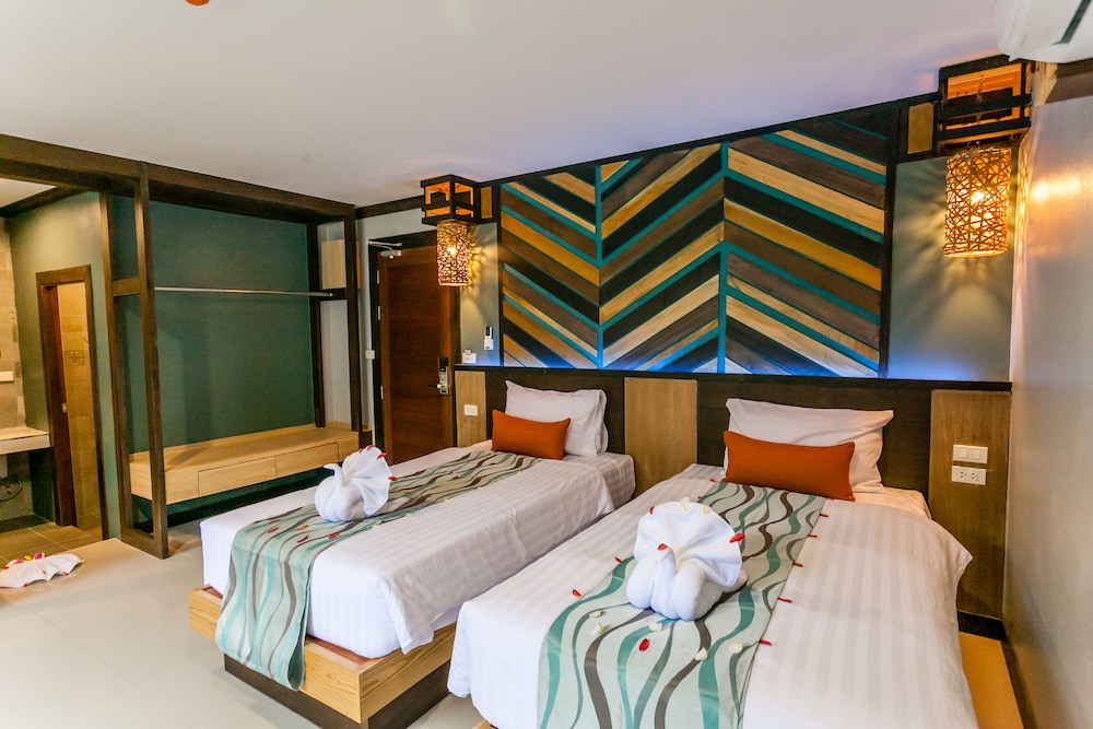 Habitación superior con 2 camas individuales del hotel Chaokoh Phi Phi and Resort. Foto 1