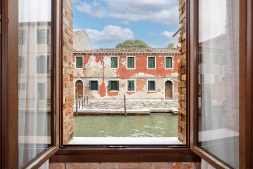 Habitación Doble con sofá cama del hotel Eurostars Residenza Cannaregio. Foto 8