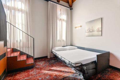 Junior suite Vista Jardín 1 Cama queen Vista Patio del hotel Eurostars Residenza Cannaregio. Foto 7