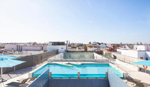 Habitación Twin Estándar con sofá del hotel Macia Sevilla Kubb