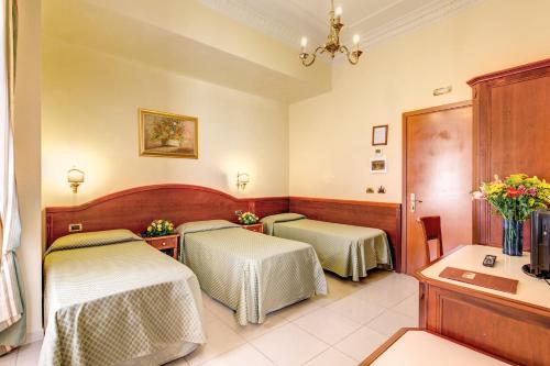 Habitación cuádruple del hotel Contilia