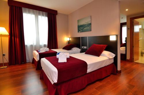 Habitación Cuádruple Clásica del hotel Clement Barajas. Foto 4