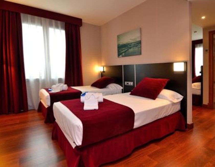 Habitación Cuádruple Clásica del hotel Clement Barajas. Foto 4