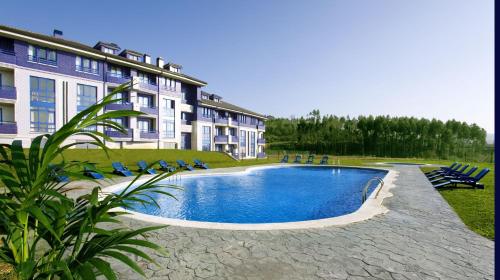 Apartamento de 1 dormitorio con vistas a la piscina del hotel Dunas De Liencres